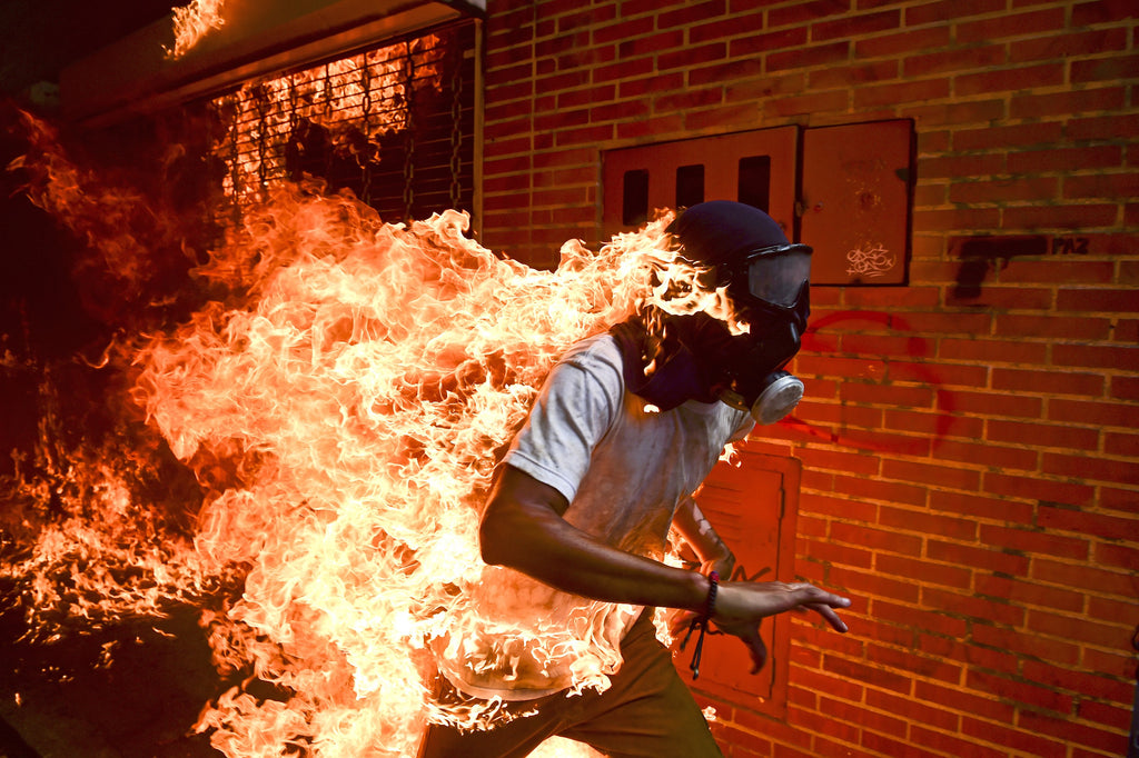 Canon congratulates winners of the 2018 World Press Photo Awards, and sets out its 2018 commitment to photojournalism