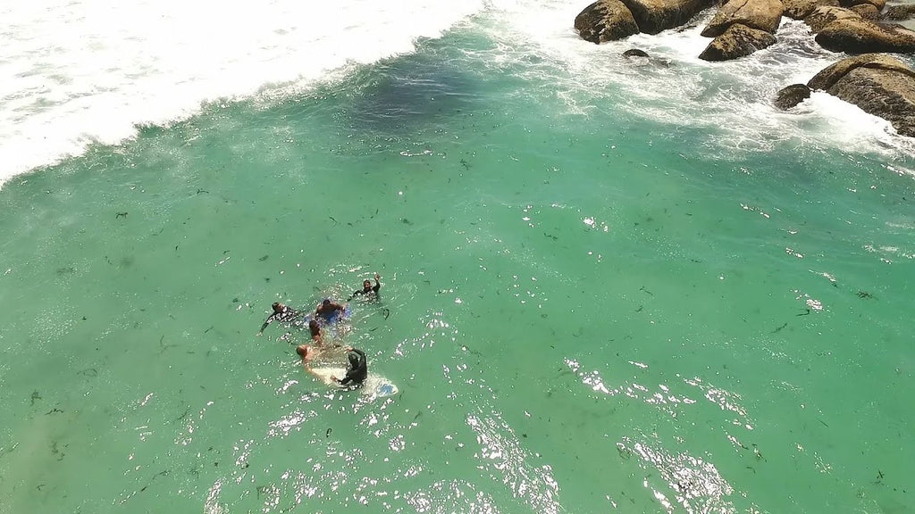 Drowning swimmers saved by local surfers - footage captured by drone
